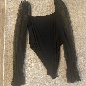Sheer long sleeve black polka dot bodysuit